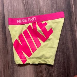 Neon yellow/pink Nike tights